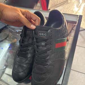 Gucci Black Microguccissima Leather Web Low Top Sneakers